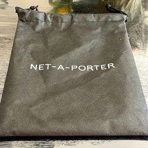 Black drawstring dust bag NWOT.